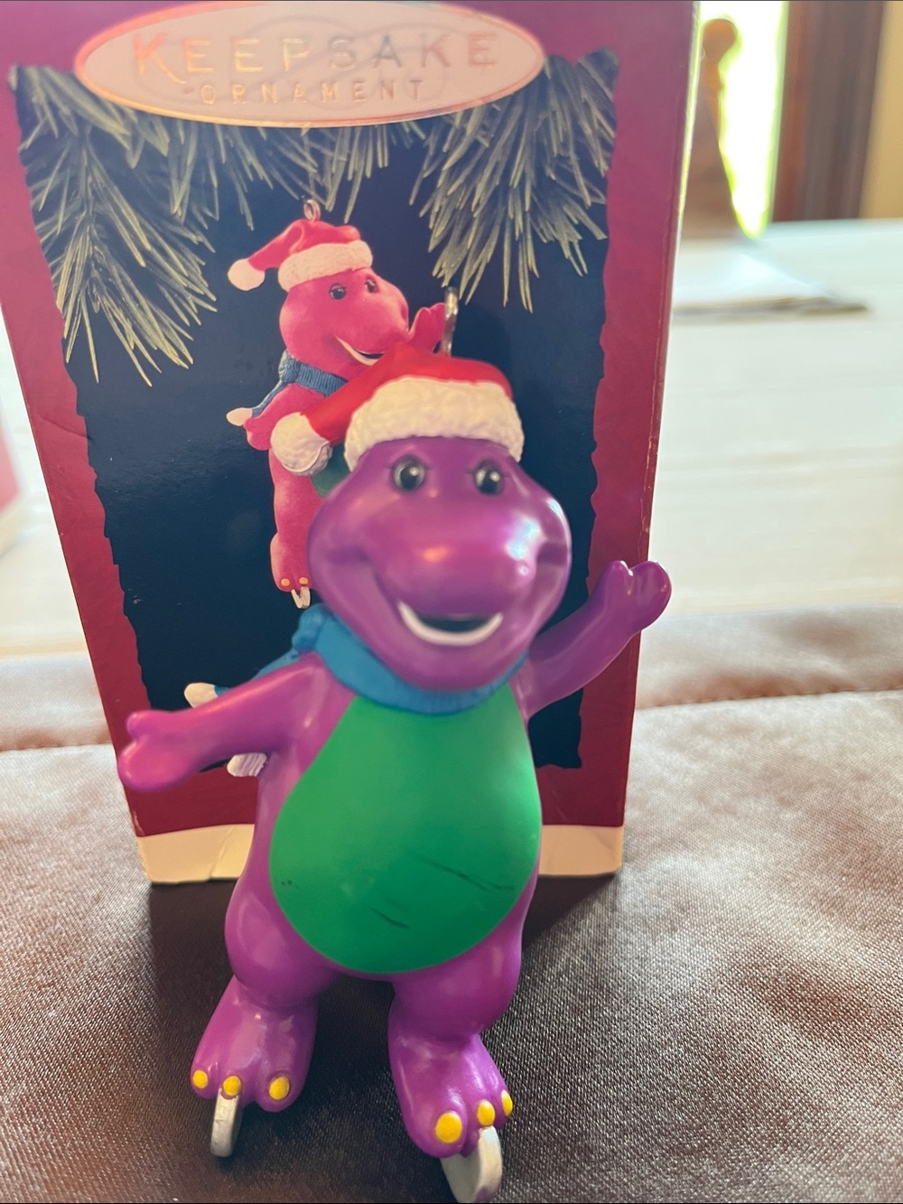 Hallmark Purple & Green Barney Skating Ornament with Santa Hat